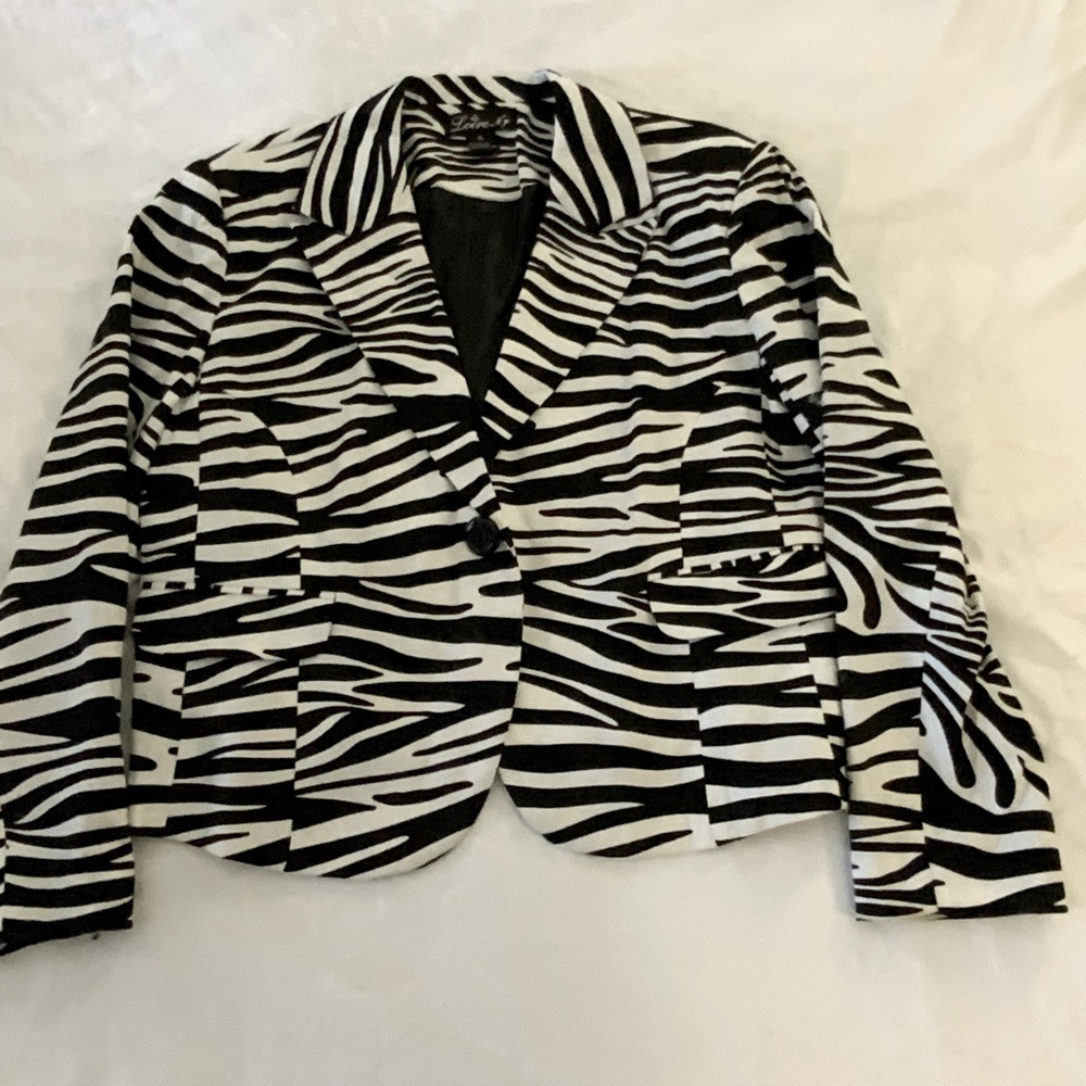 Zebra print blazer; can go from day ware to night.
